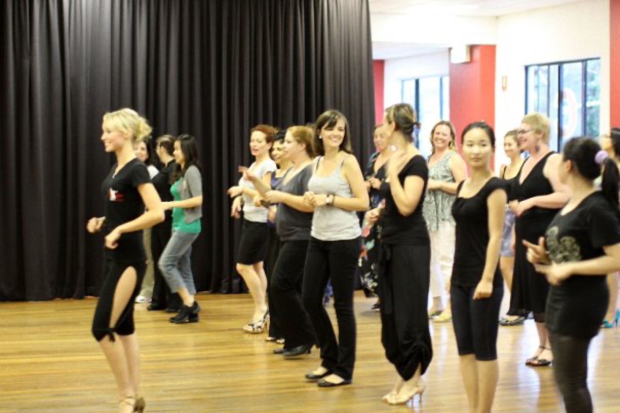 Jacki teaching a Latin dance class